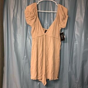 Volcom Women's Moonblast Babydoll Fit Romper in the color Taupe